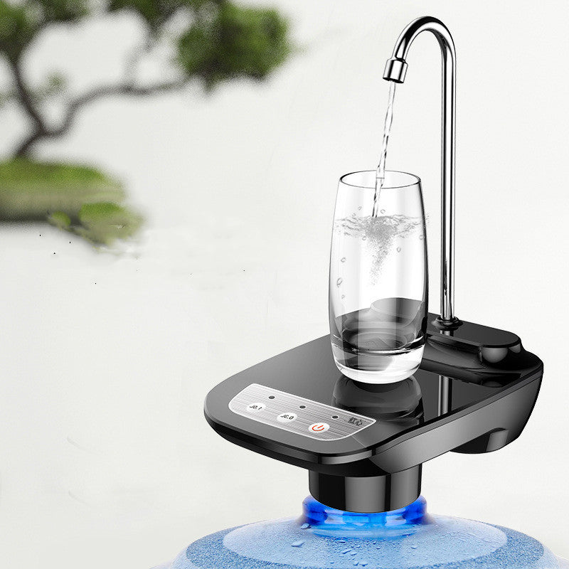 USB rechargeable water dispenser pump with tray on a countertop
One-key quantitative water output dispenser with stainless spout
Compact ABS water pump in black and white variants
Electric water dispenser pumping into a glass with drip tray