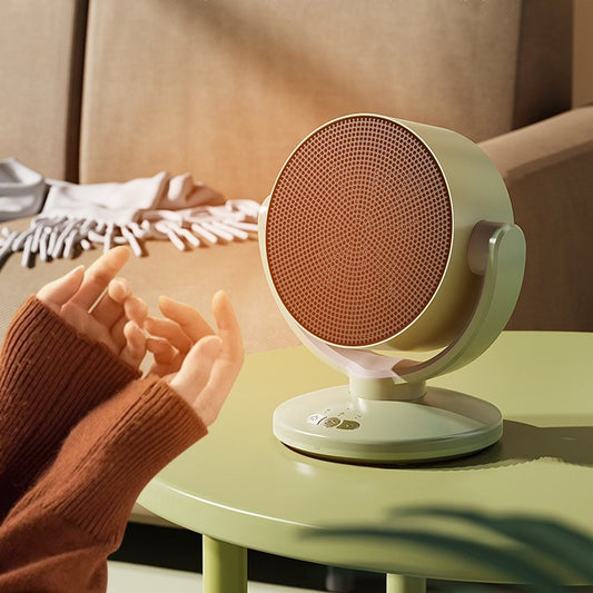 “Desktop mini household electric heater – compact energy-saving personal heater”