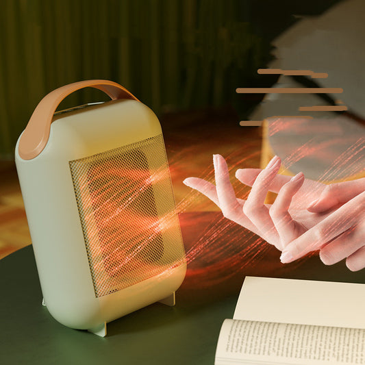 Avocado green 1200W PTC desktop fan heater (QY-01) with adjustable louvres

Close-up of six-gear control on Small Sun heater (touch/button versions)

Compact stove-style mini space heater on an office desk

Front view of QY-01 heater directing warm airflow
