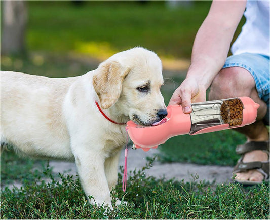 “3-in-1 portable pet water bottle with feeder bowl and garbage bag storage for dogs and cats”