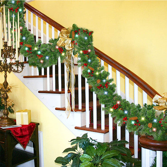2.7m artificial Christmas garland with pinecones, red fruits, and optional LED lights for holiday decoration