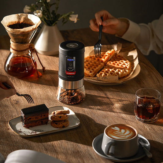 Portable manual conical-burr coffee grinder with detachable handle

Hand grinder adjusting grind size for espresso to French press

Compact travel coffee grinder next to beans and cup

Disassembled hand grinder showing burr and grounds container